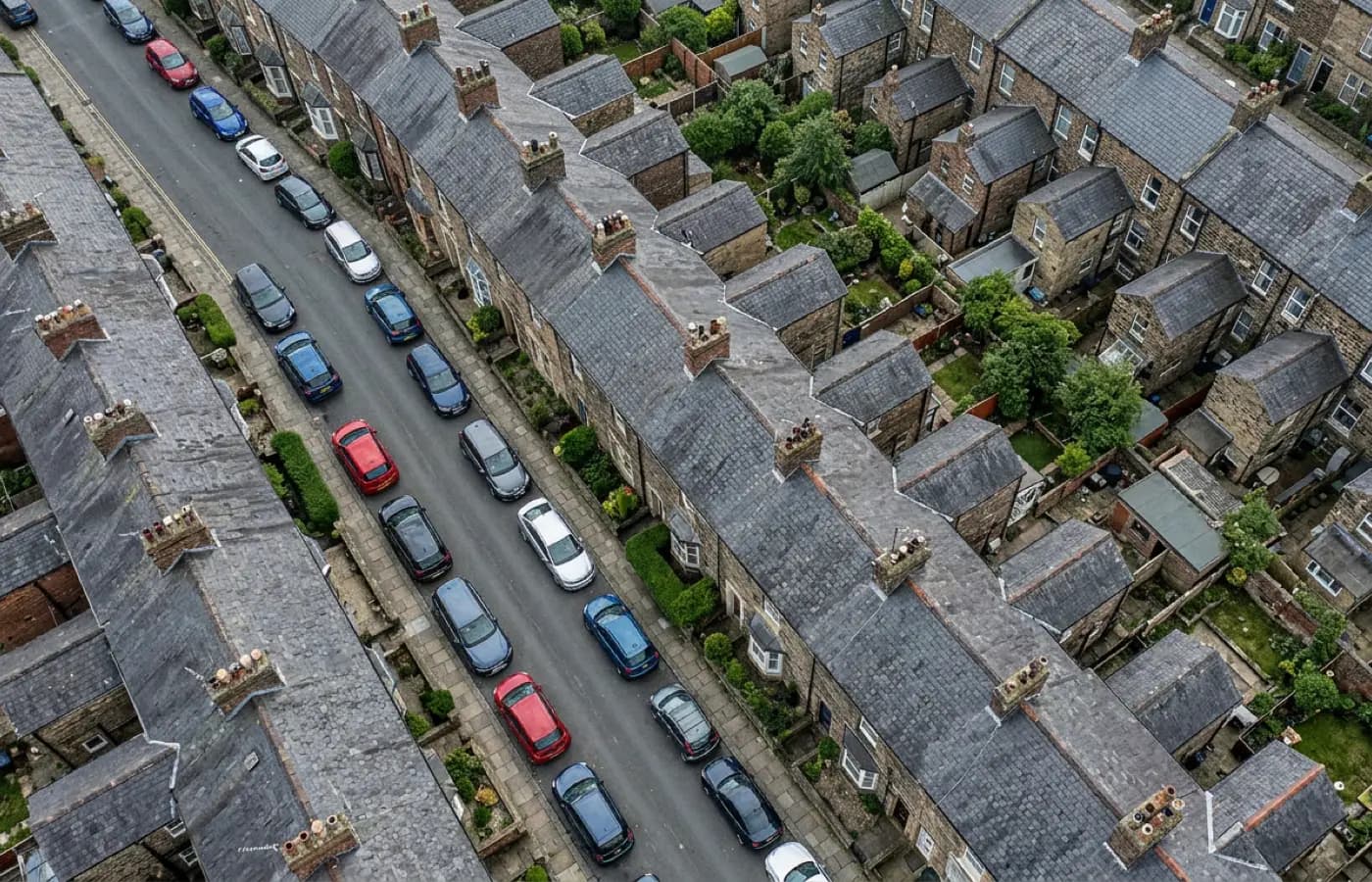 Aerial view straight down a tightly packed Devon terrace, showing how little room there is for a scaffold lorry to park
